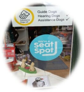 Sign with SeatSpot logo in shop window