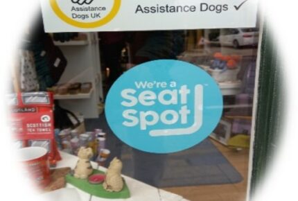 Sign with SeatSpot logo in shop window